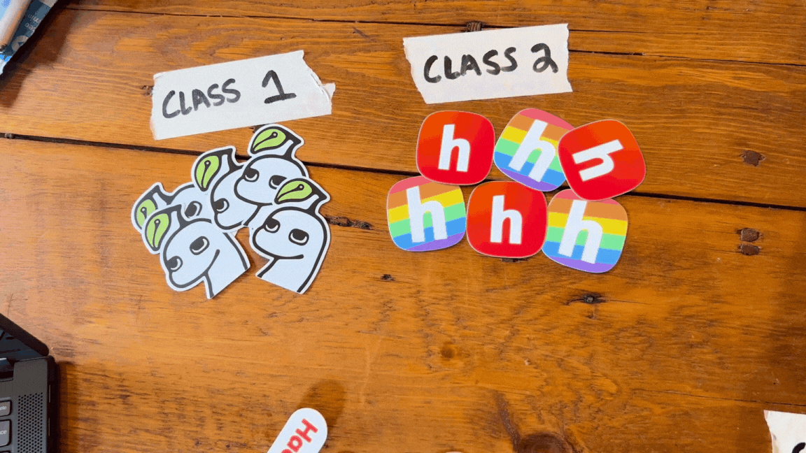 sorting stickers into respective piles based on existing data